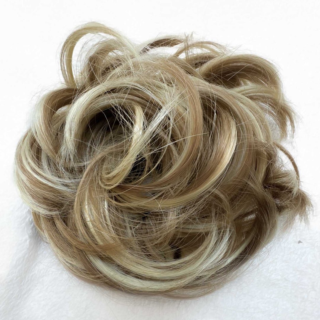 messy hair bun scrunchie#color_honey-blonde-mix-bleach-blonde