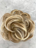 blonde woman hair bun