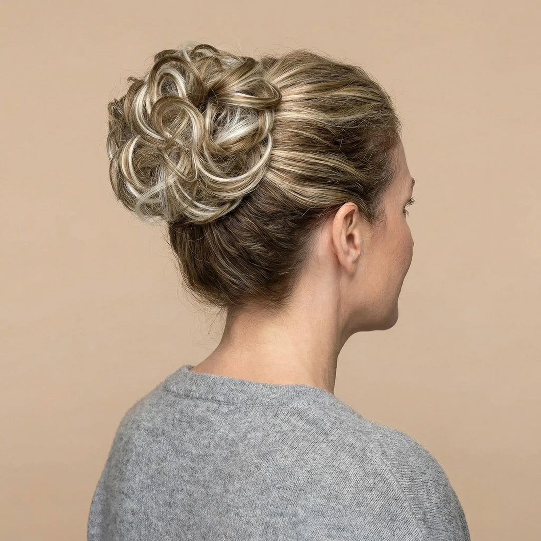 messy bun curly small brown mix blonde hair #color_blonde-mix-grey-hair