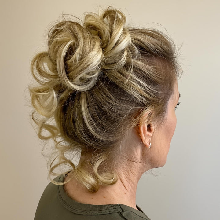 brown mix blonde hair bun#color_light-brownish-blonde