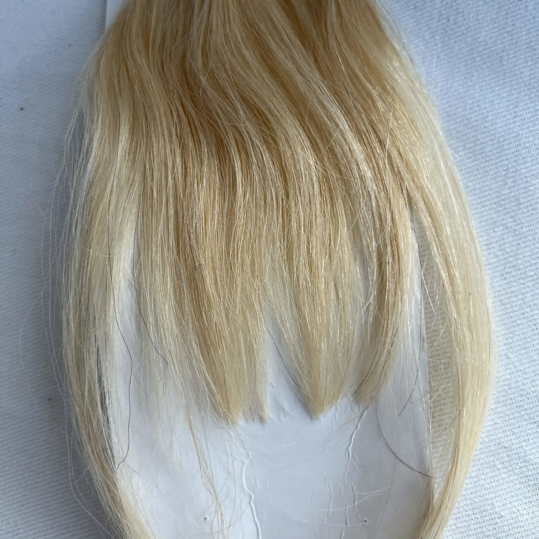 blonde human hair clip in bangs