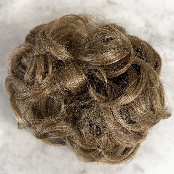 Messy brown hair bun