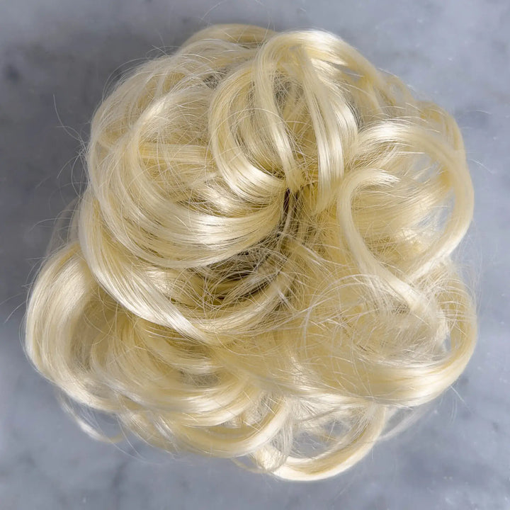 messy blonde hair bun#color_pure-blonde
