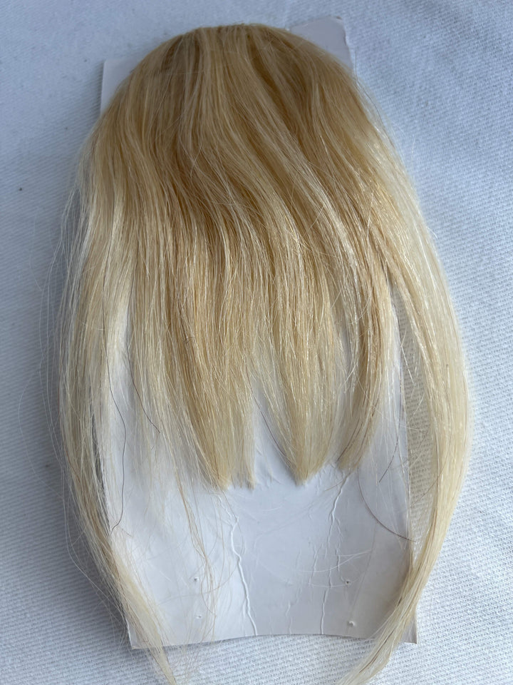 blonde human hair clip in bangs