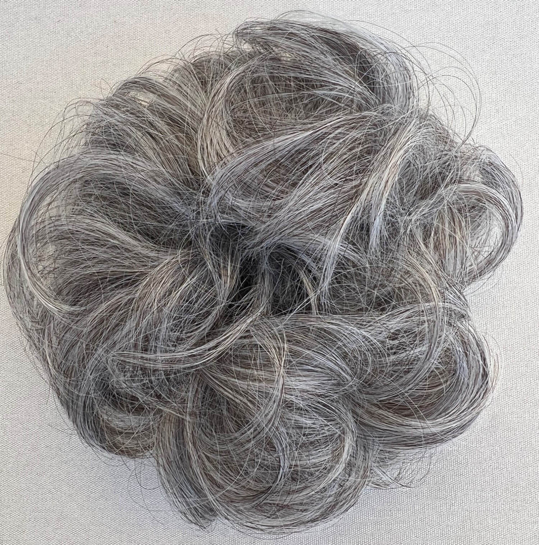 grey mix hair bun#color_dark-grey-salt-and-pepper